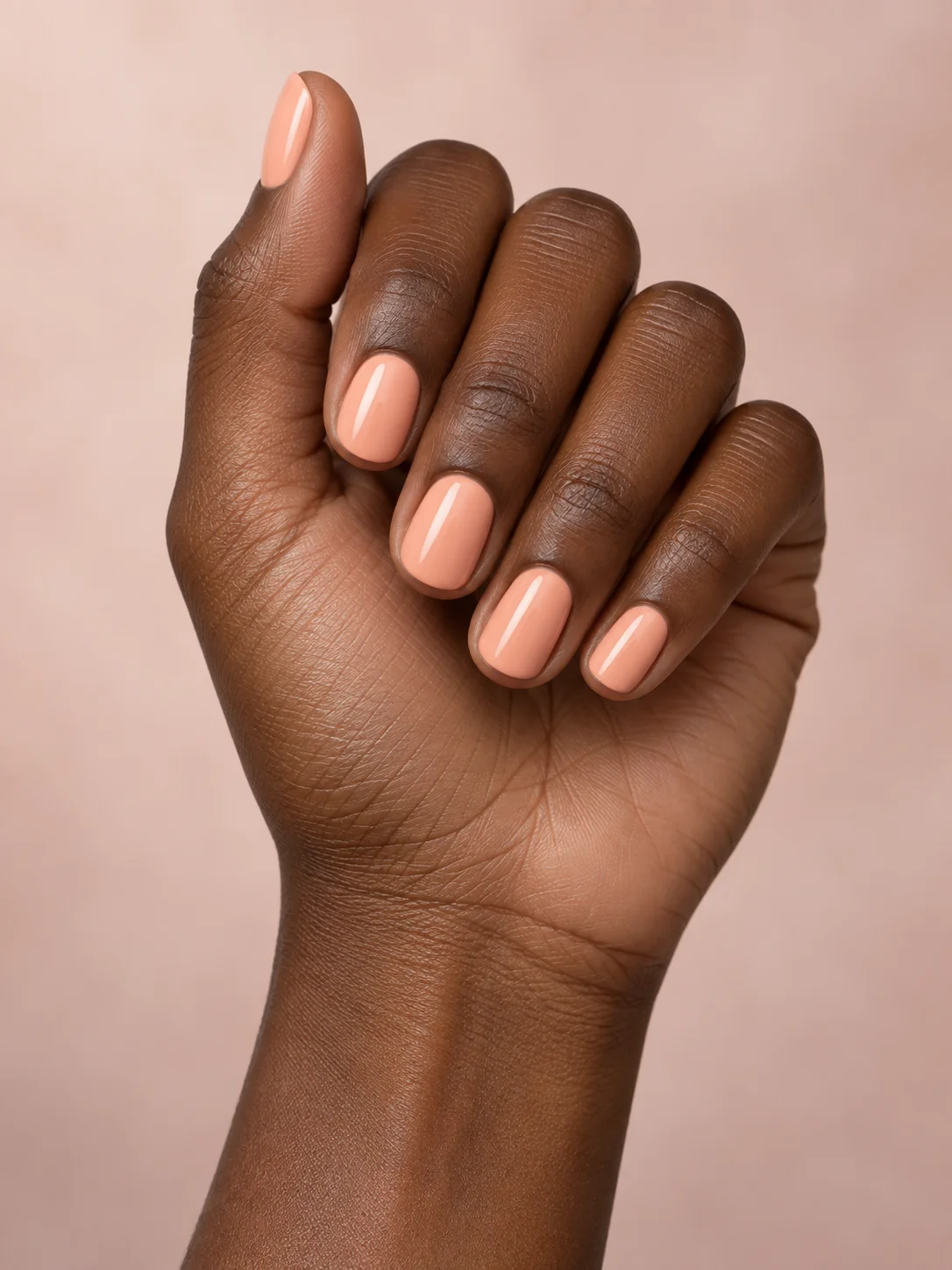 Creamy peach and short round tips make a cheerful, uncomplicated pairing.